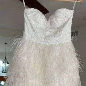 Bebe mini dress feather & sequin size S